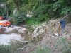 Геодезический прибор на вырубленном склоне