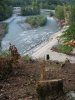 Вид со склона на реку Мзымту и проложенную с левой стороны ее русла технологическую дорогу