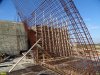 Перекошенная опалубка на остановленной незаконной стройке на Благовещенской косе