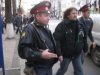А.Рудомаху ведут под конвоем автоматчиков
