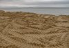 (2011.03.21) Техника работала непосредственно на урезе моря