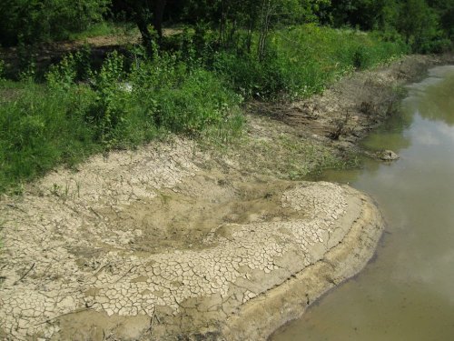 Уровень сошедшей из водоема воды