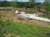 Потоком унесло бетонные конструкции с плотины