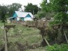 Дом на слиянии рек Псыж и Шидс, через который шел поток воды