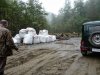 Возможно, часть мешков с цементом, которые располагались на строительной площадке в русле Шахе, во время паводка оказалась в ре