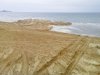 Следы работы техники на берегу Черного моря