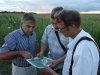 Валерий Бриних показывает Сергею Цыпленкову расположение навозохранилищ