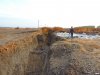 Ров в который сгребается соженный мусор 