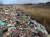 Энем, пойма ручья на западной окраине поселка завалена отходами на глубину более 5 метров
