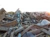 Части дверных и оконных рам, деревянные поддоны - всё валится сюда