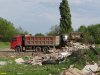 Незаконную свалку отходов за Гидростроем убирают