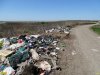 Якобы "закрытая" еще в 2013г свалка на берегу  оз. Ханское, Ейский район