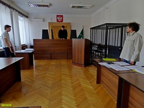 Судья Удычак зачитывает решение по делу "Минюст против ЭВСК"