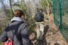 Активисты ЭкоВахты идут вдоль забора
