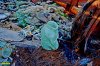От температуры огня плавилось стекло