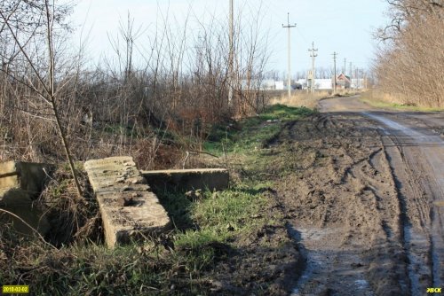 Разбитая большегрузами улица Яблоневая в СНТ "Урожай"