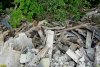Слой захороненных отходов имеет высоту более 15 метров