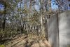 Лес Хлибизи. В лесном фонде незаконно построен капитальный забор