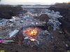 Сжигание мусора на нелегальной свалке, организованной на земельном участке 23:43:0121011:2098 в поселке Индустриальный