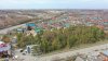 Часть территории сквера "Сосновая роща" (ст.Северская) захвачена под торговый комплекс, а также ресторан, кафе и магазин