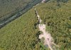 Вид на склон хребта Котх, изуродованный просекой под канатную дорогу