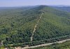 Просека под незаконно строящуюся канатную дорогу прорезала хребет Котх 