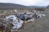 Пластик, строительные отходы и ветки на свалке в Сукко 