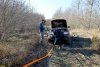 Участника выезда вытаскивают из колеи буксующий автомобиль на Бжидском хребте, слева - перспективная ООПТ "Лес над селом Бжид" 