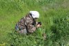Исследователь А.Рудомаха фотографирует черепаху Никольского в перспективной ООПТ Гора Султанская