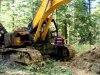 Сгоревший экскаватор лесозаготовителей