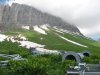 Альпийские луга на западных склонах горы Фишт завалены конструкциями новой канатной дороги